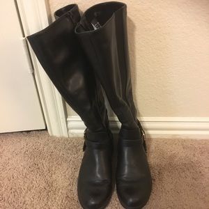 Tall black riding boots